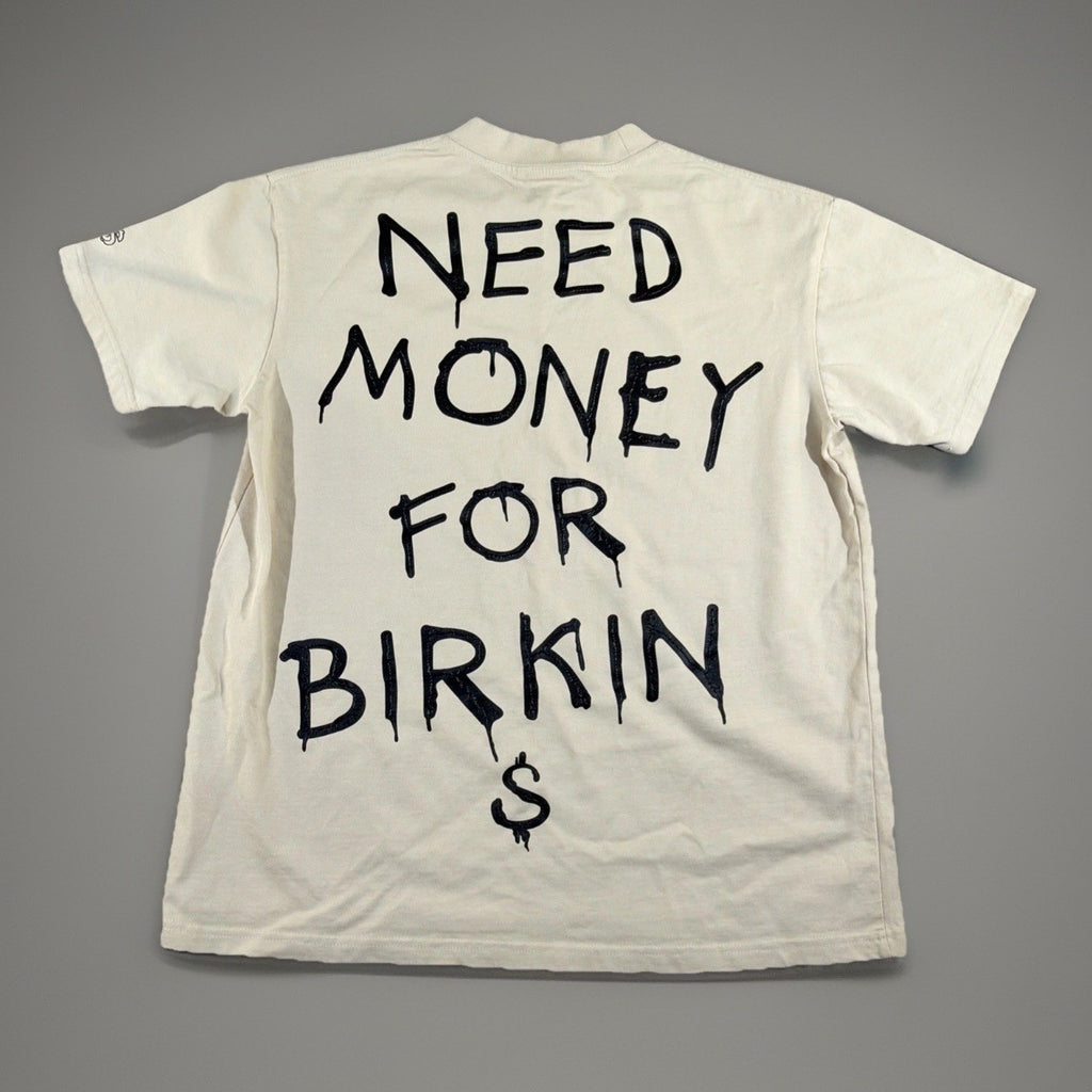 SMAKER cream-colored t-shirt features the graphics NEED MONEY FOR BIRKIN - Fashi