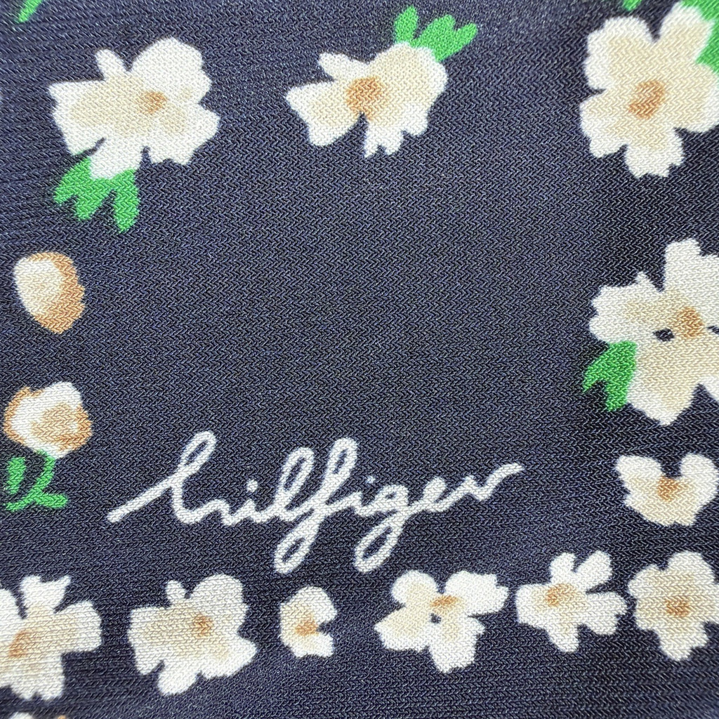 Tommy Hilfiger blouse features a dark blue base with a white plaid pattern