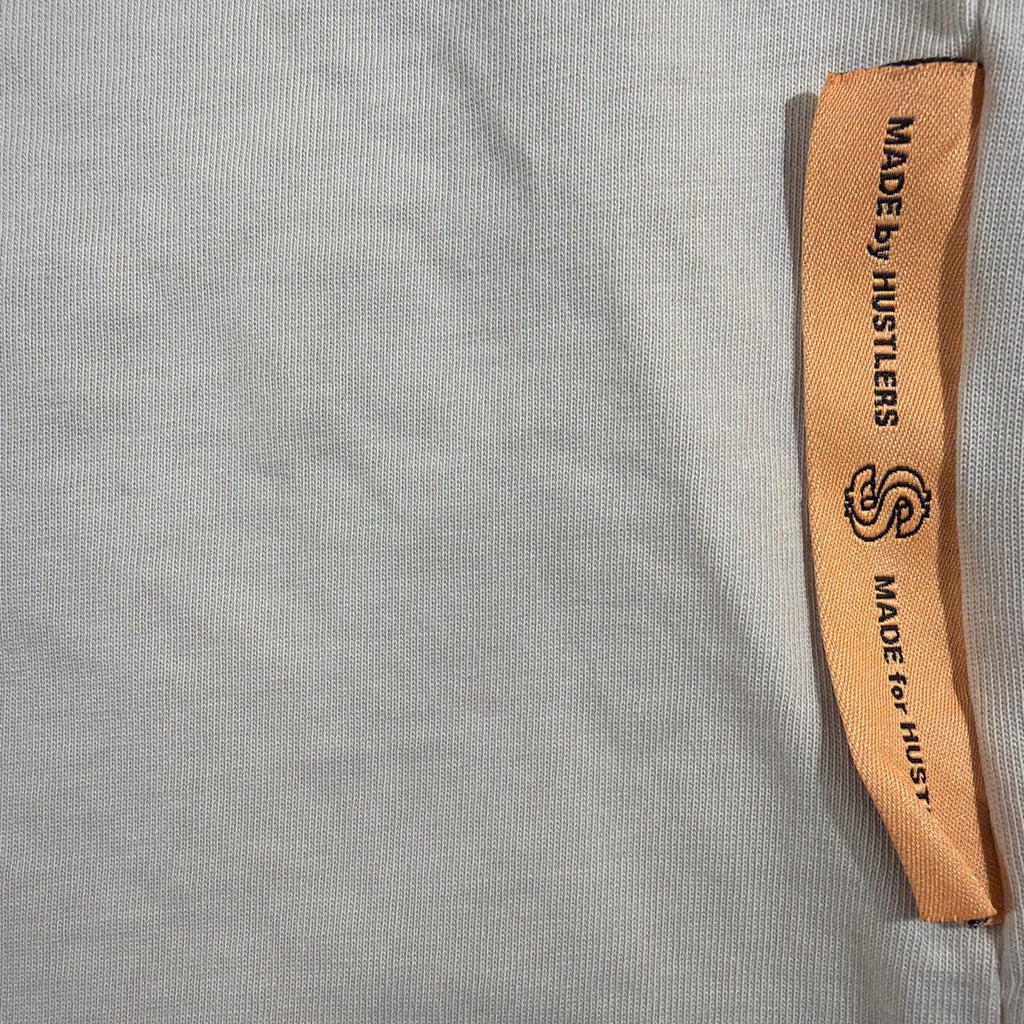 SMAKER cream-colored t-shirt features the graphics NEED MONEY FOR BIRKIN - Fashi