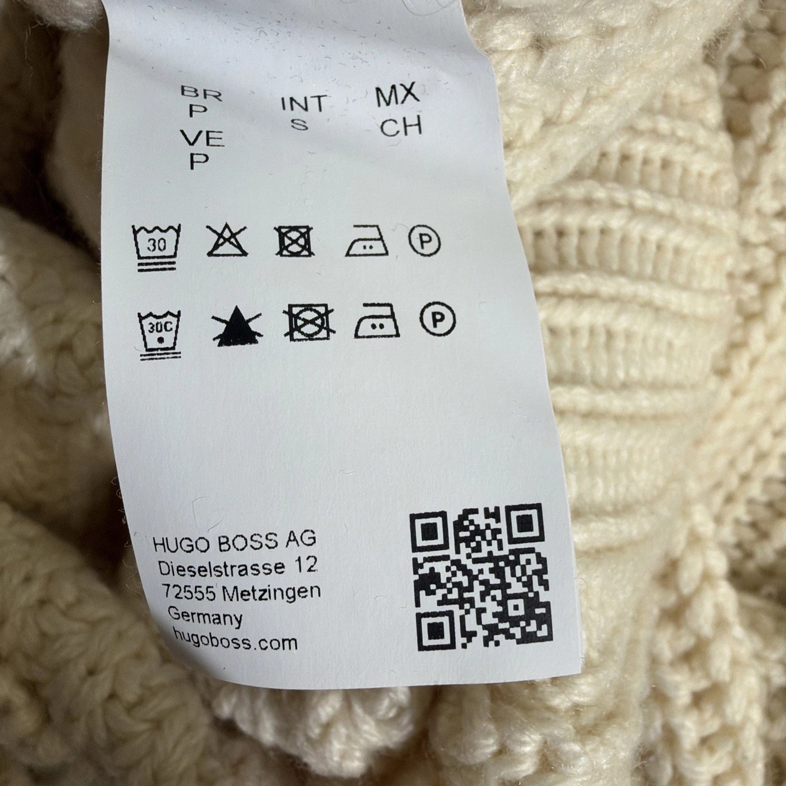HUGO BOSS turtleneck sweater is a men's cashmere pullover in White Color