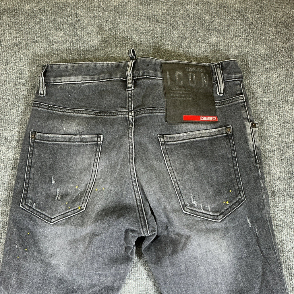 Dsquared2 Men's Black Slim Fit Distressed Paint Splatter Jeans – Size 44