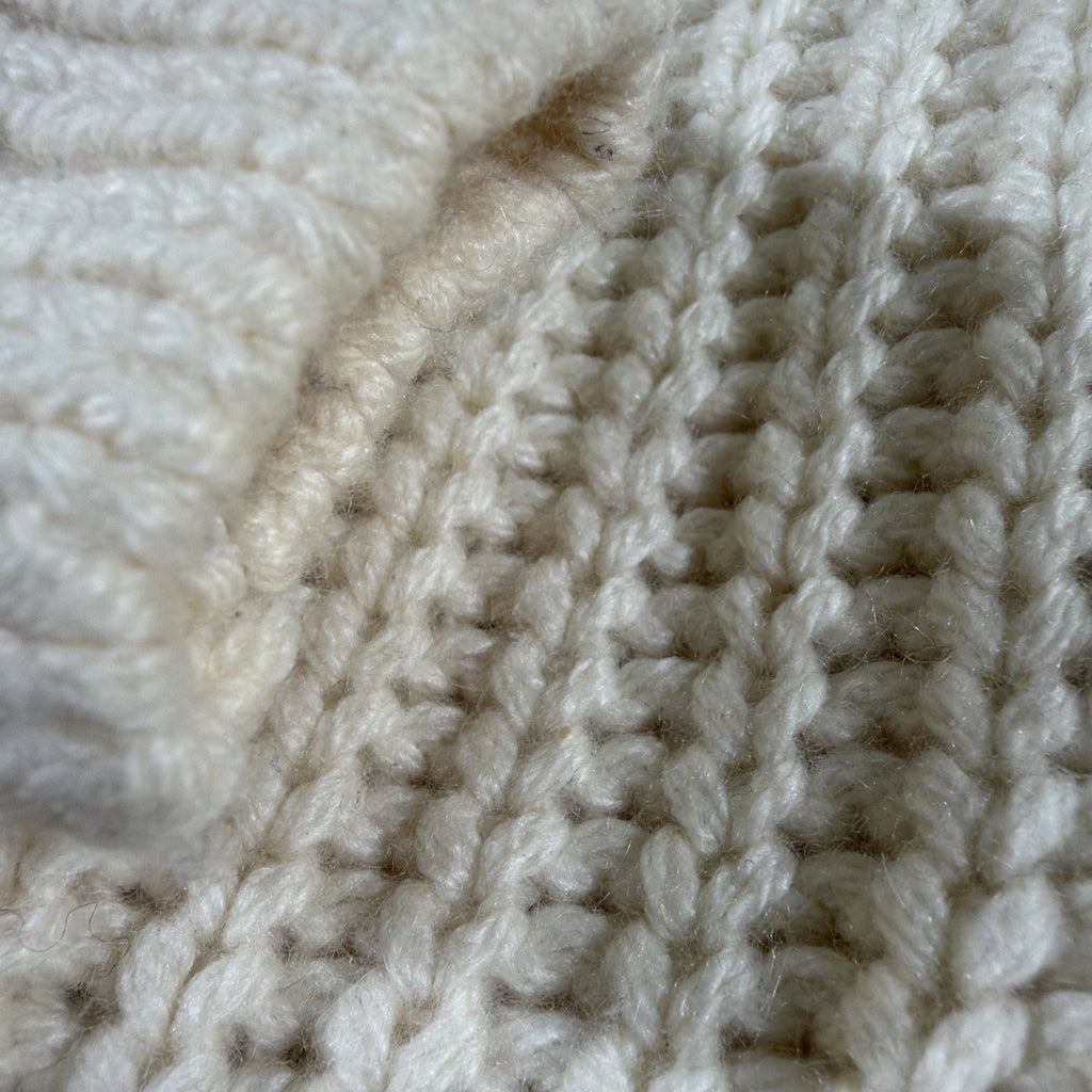 HUGO BOSS turtleneck sweater is a men's cashmere pullover in White Color