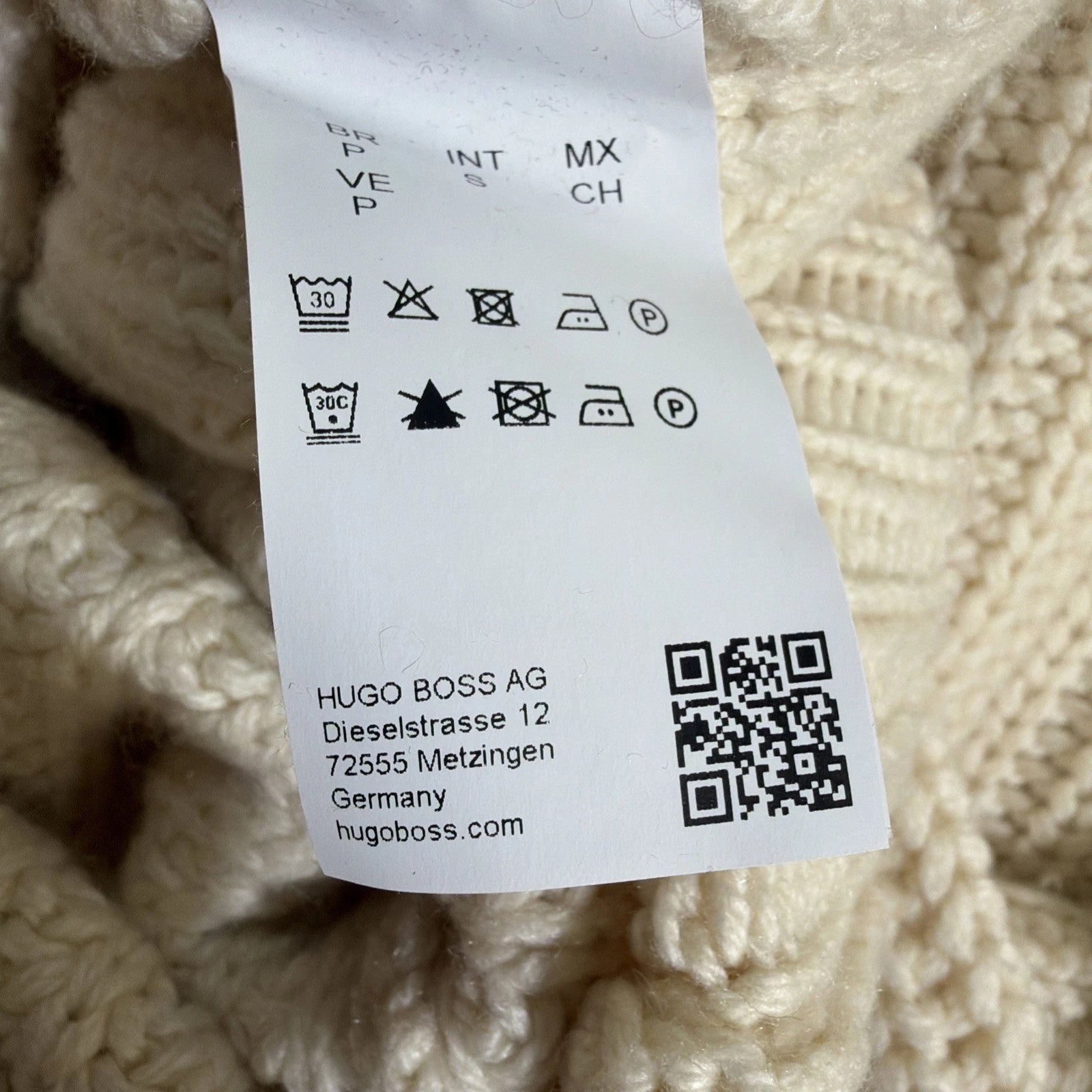 HUGO BOSS turtleneck sweater is a men's cashmere pullover in White Color
