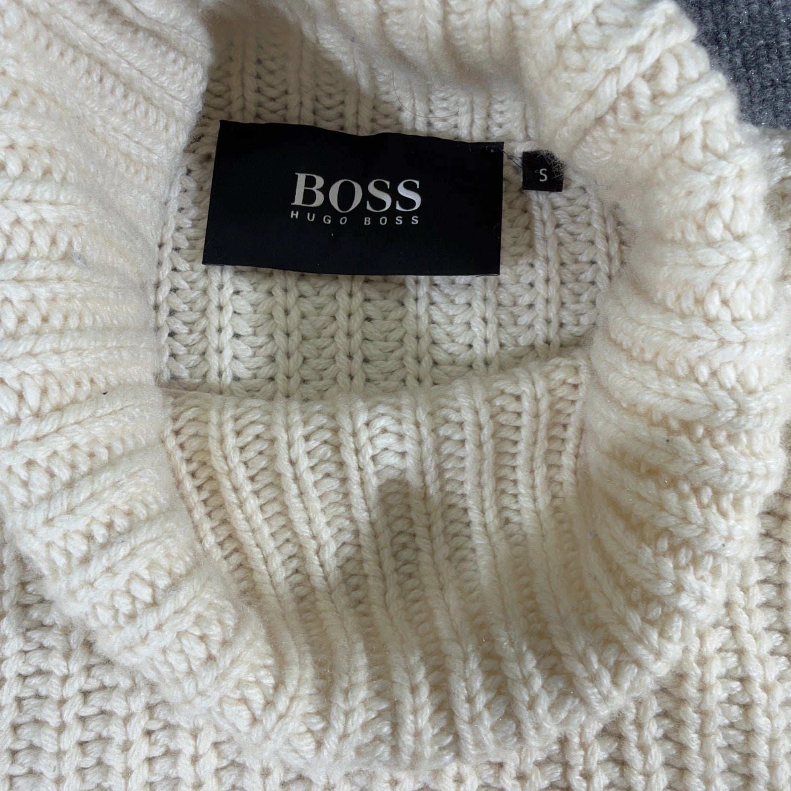 HUGO BOSS turtleneck sweater is a men's cashmere pullover in White Color